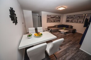 Deluxe Apartment, 1 Bedroom, Balcony, Sea View | Living area | LCD TV - Sunset Apartments (Vir)