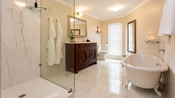 Designer toiletries, hair dryer, bathrobes, towels