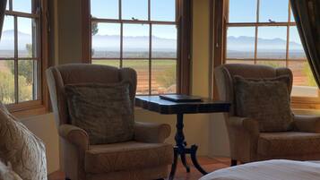 Deluxe Suite, Terrace, Mountain View | Egyptian cotton sheets, premium bedding, minibar, in-room safe