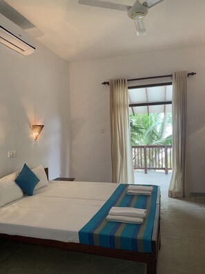 Habitació doble Deluxe | Cobrellits i matalassos de la marca Select Comfort 