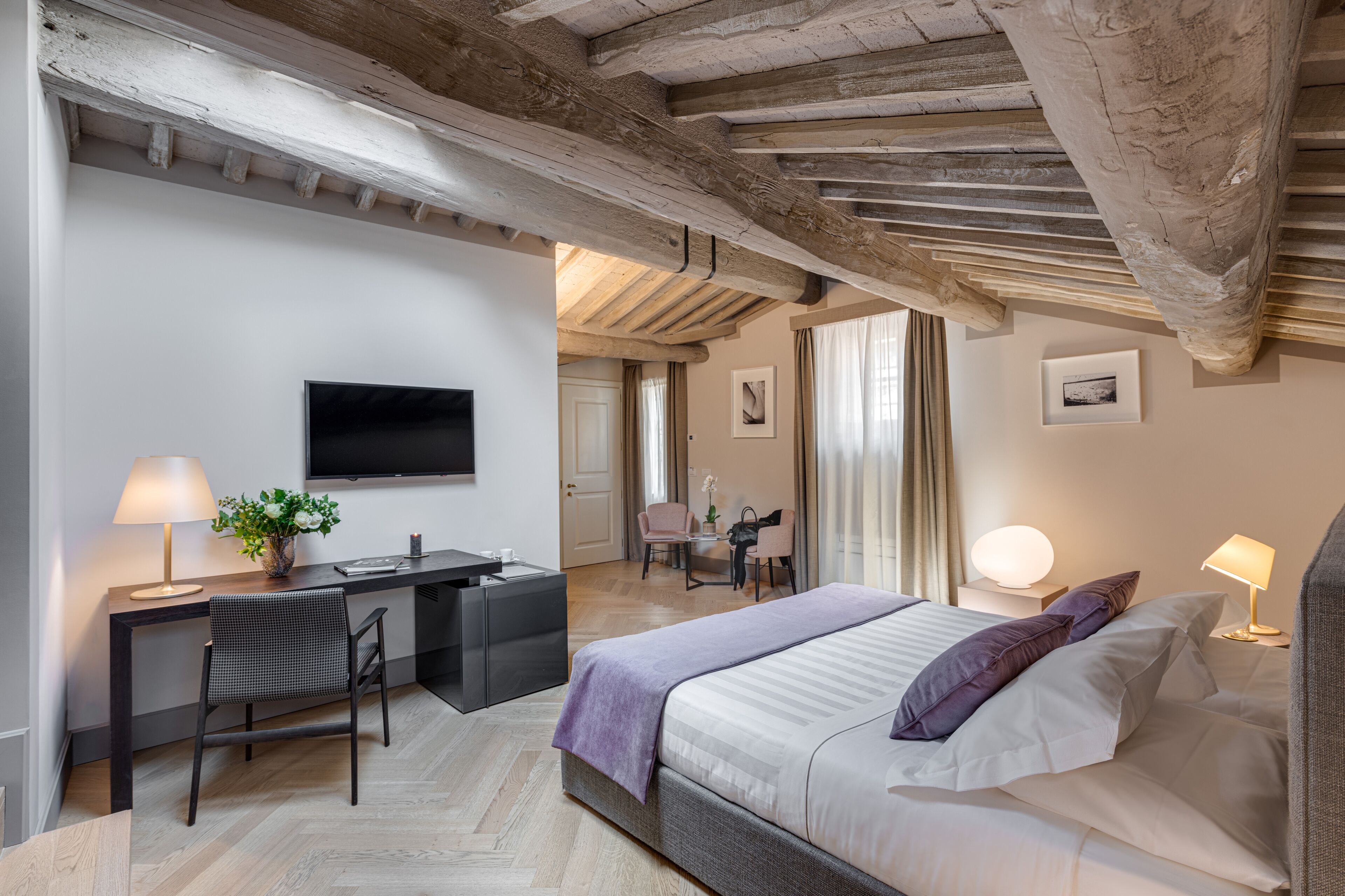 Suite junior | Ropa de cama de alta calidad y minibar 