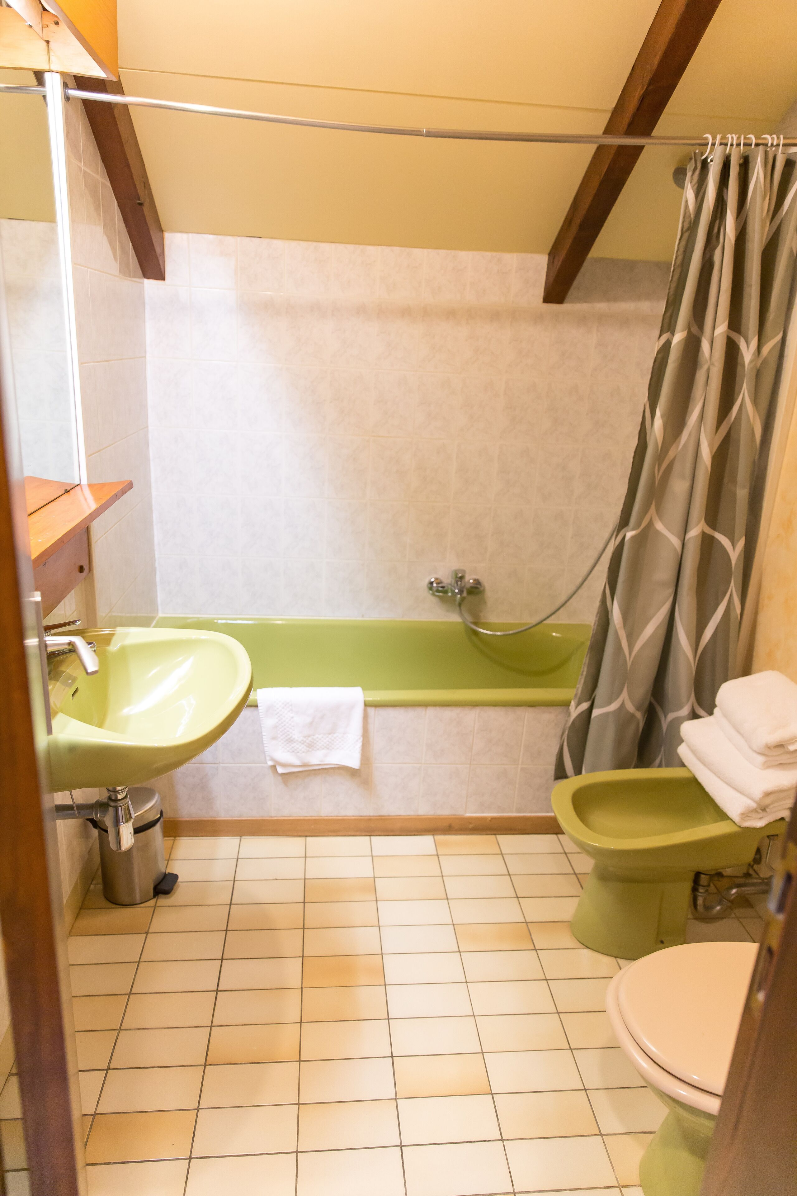 bathtub, free toiletries, hair dryer, towels