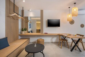 Superior Studio, 1 King Bed | Living area | 43-inch flat-screen TV with satellite channels, TV - Esplanade Apartments (Chania)