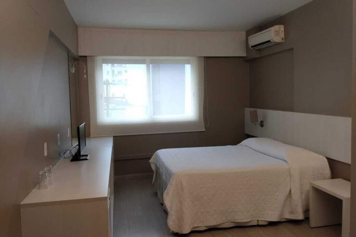 Superior Double Room | Minibar, in-room safe, desk, blackout drapes