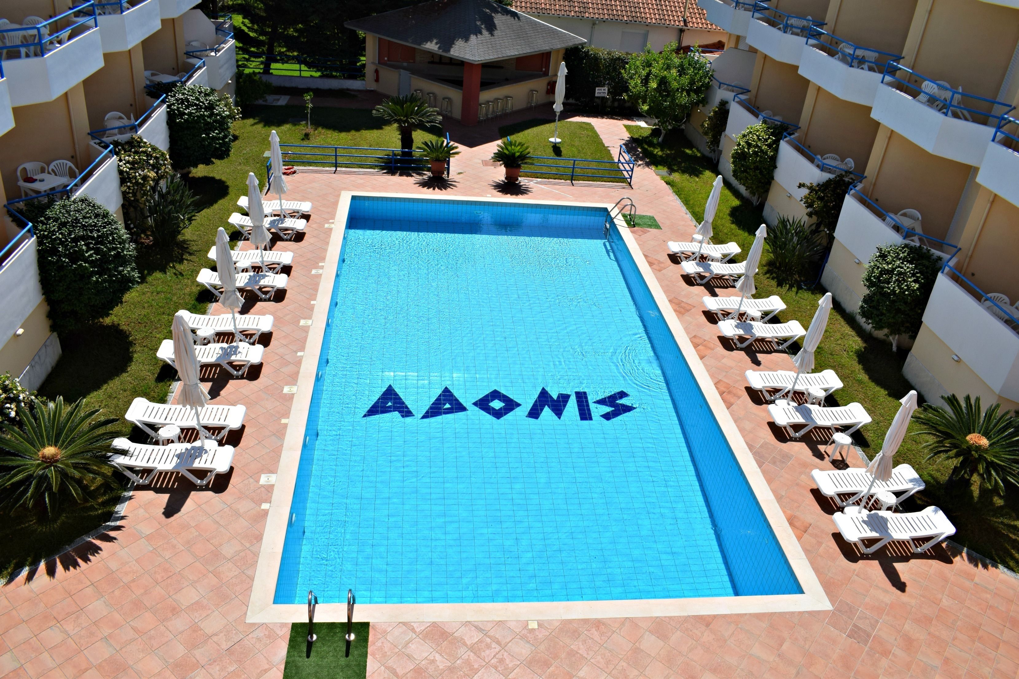 Seasonal outdoor pool, open 11:00 AM to 8:00 PM, pool umbrellas