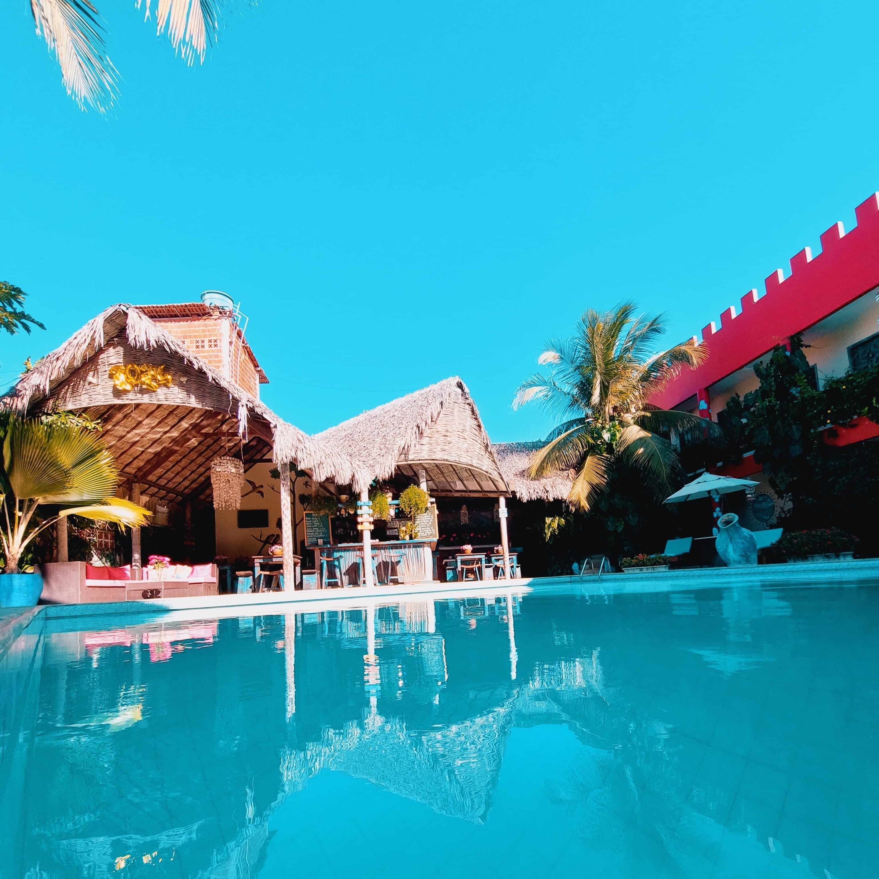 Outdoor pool, pool umbrellas, sun loungers