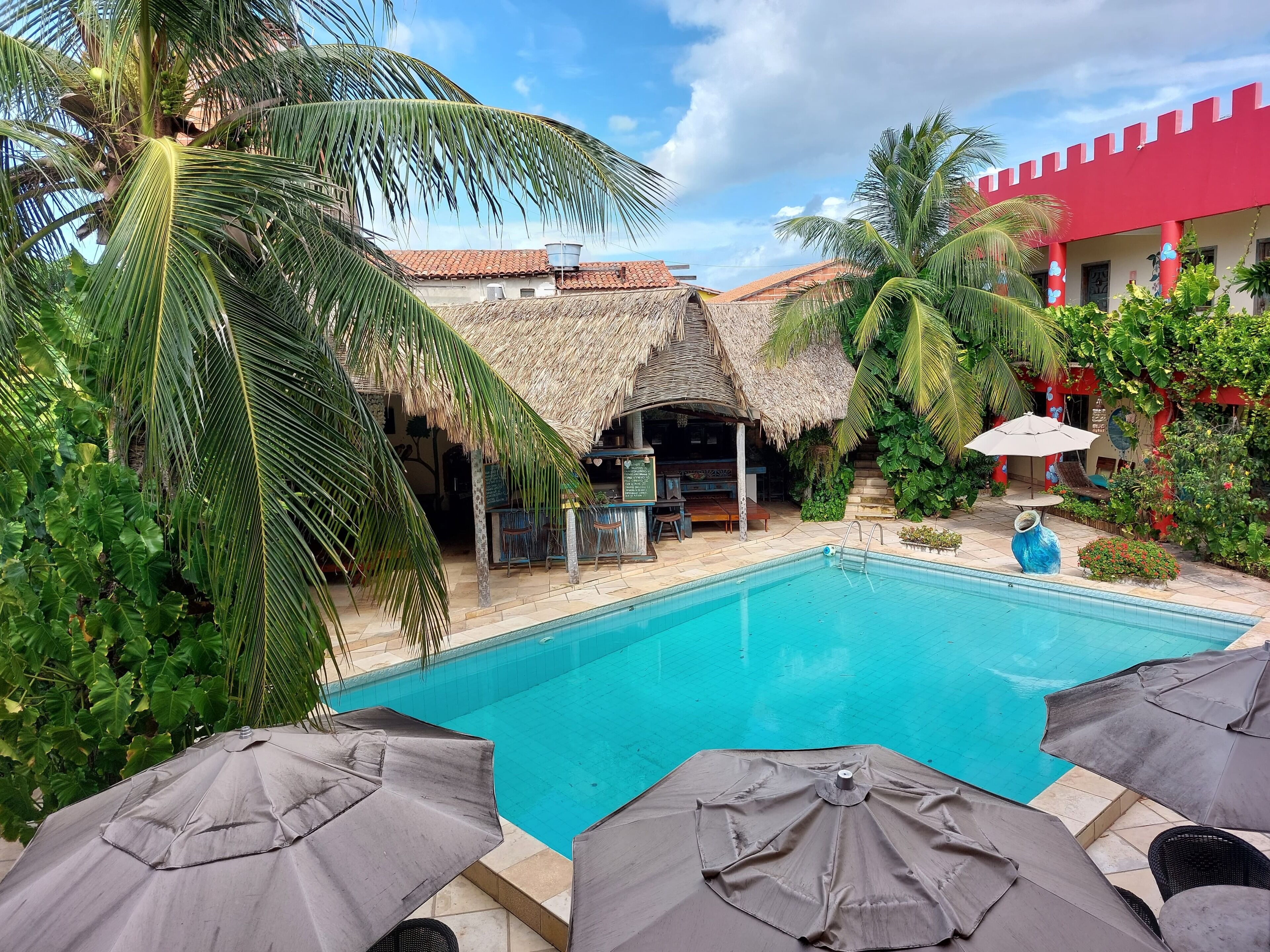 Outdoor pool, pool umbrellas, sun loungers