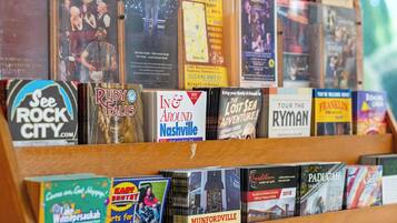 A display of travel guides and maps for Nashville and surrounding areas.