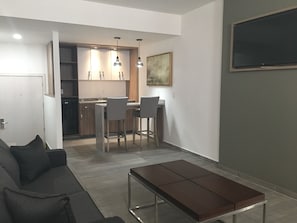 Deluxe-Suite, 1 King-Bett und Schlafsofa | Wohnbereich