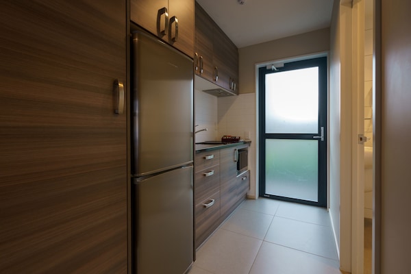 Deluxe Studio with Full Kitchen | Free WiFi, bed sheets