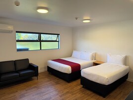 Blackout drapes, iron/ironing board, free WiFi, bed sheets