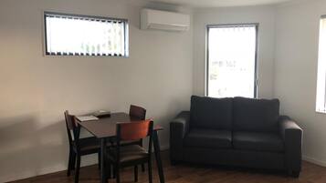 32-inch flat-screen TV with cable channels, TV