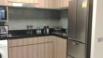 Family Condo | Private kitchenette | Full-sized fridge, microwave, stovetop, electric kettle