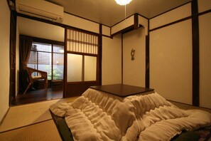 Traditional Twin Room, Non Smoking, Shared Bathroom | Blackout curtains, free WiFi, bed sheets