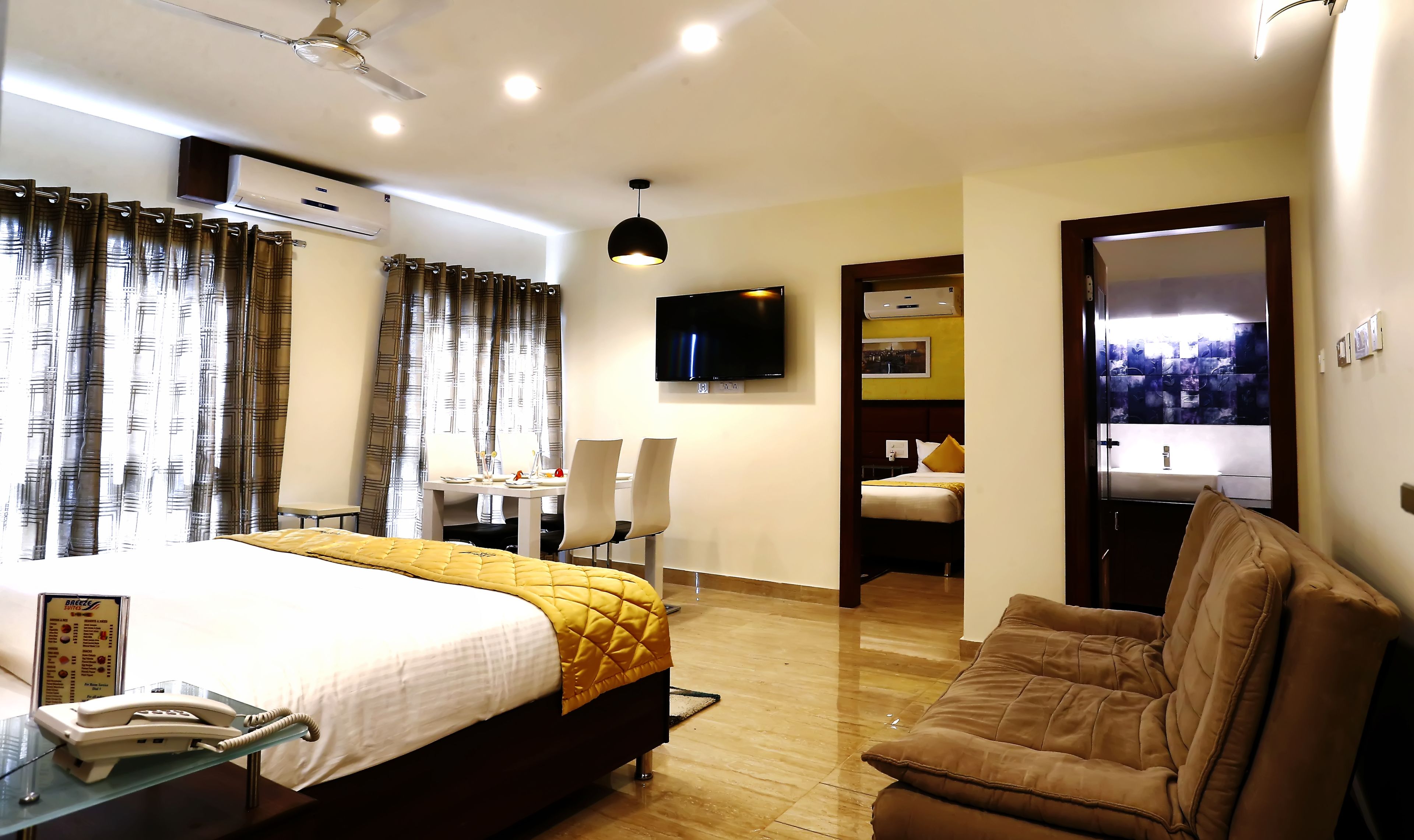 master suite room | premium bedding, in-room safe, desk, soundproofing