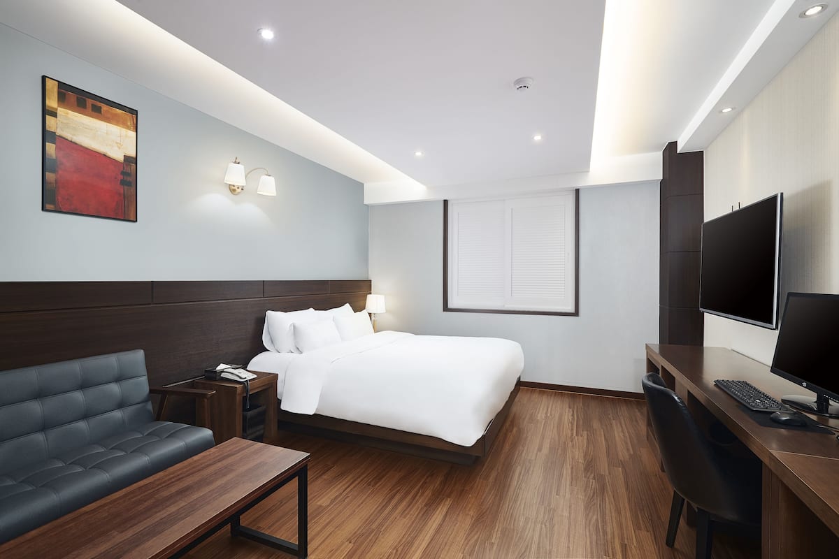 Deluxe Double Room | Premium bedding, minibar, desk, soundproofing