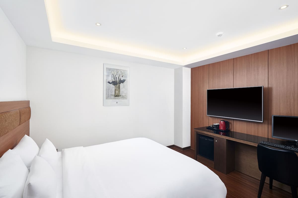 Standard Double Room | Premium bedding, minibar, desk, soundproofing
