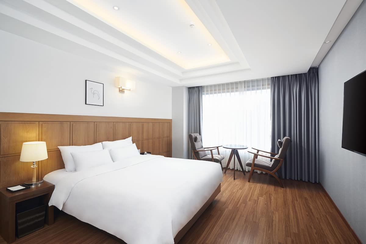 Luxury Double Room | Premium bedding, minibar, desk, soundproofing