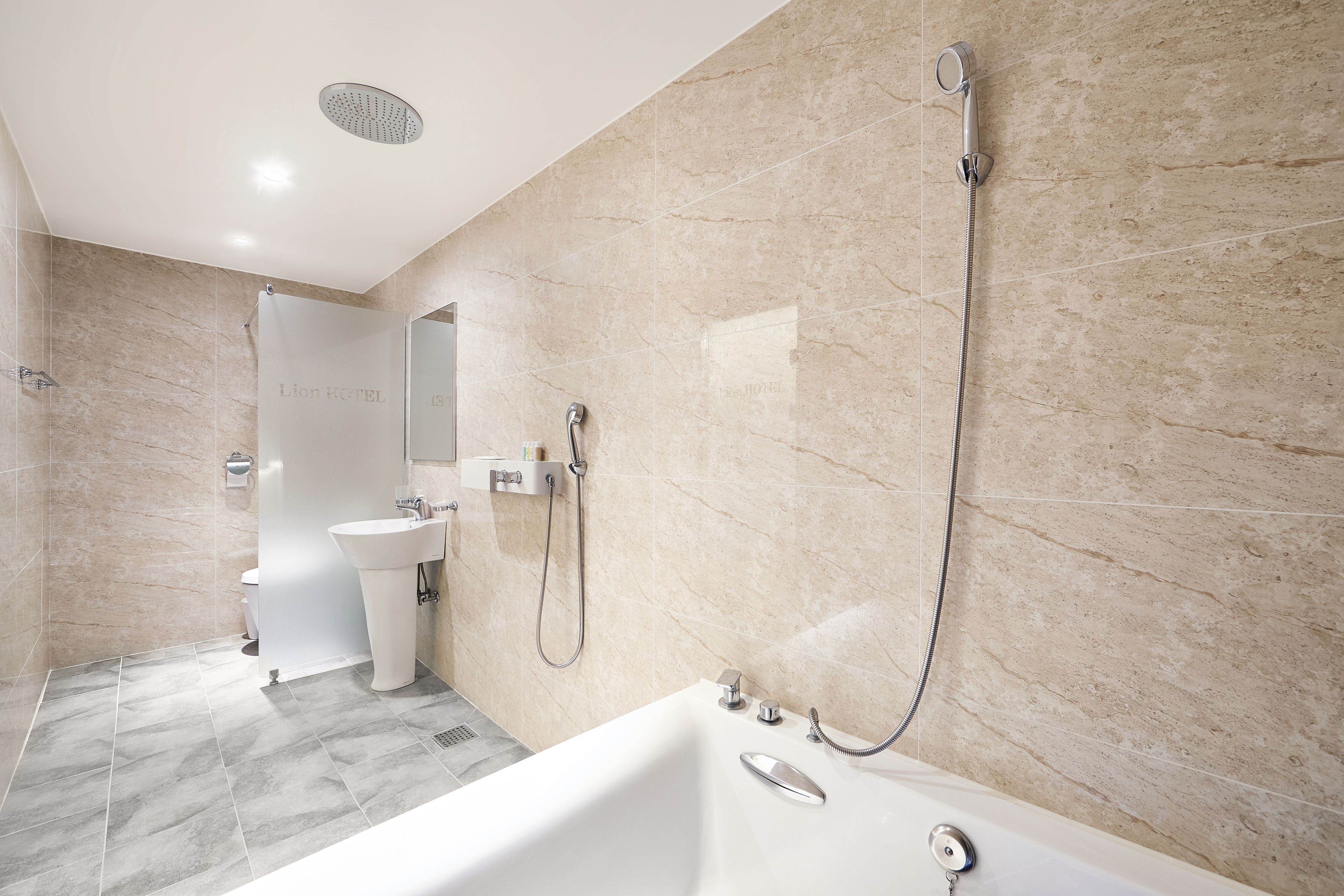 family twin room | bathroom | separate bathtub and shower, deep-soaking bathtub, free toiletries