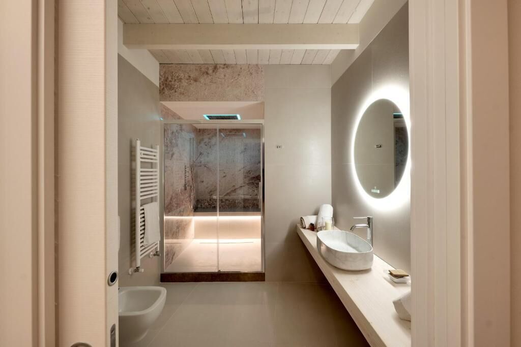 Suite, Jetted Tub | Bathroom | Shower, free toiletries, hair dryer, slippers