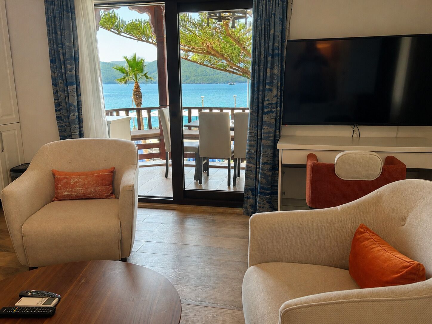 Luxury Condo, Sea View | Living area | LCD TV