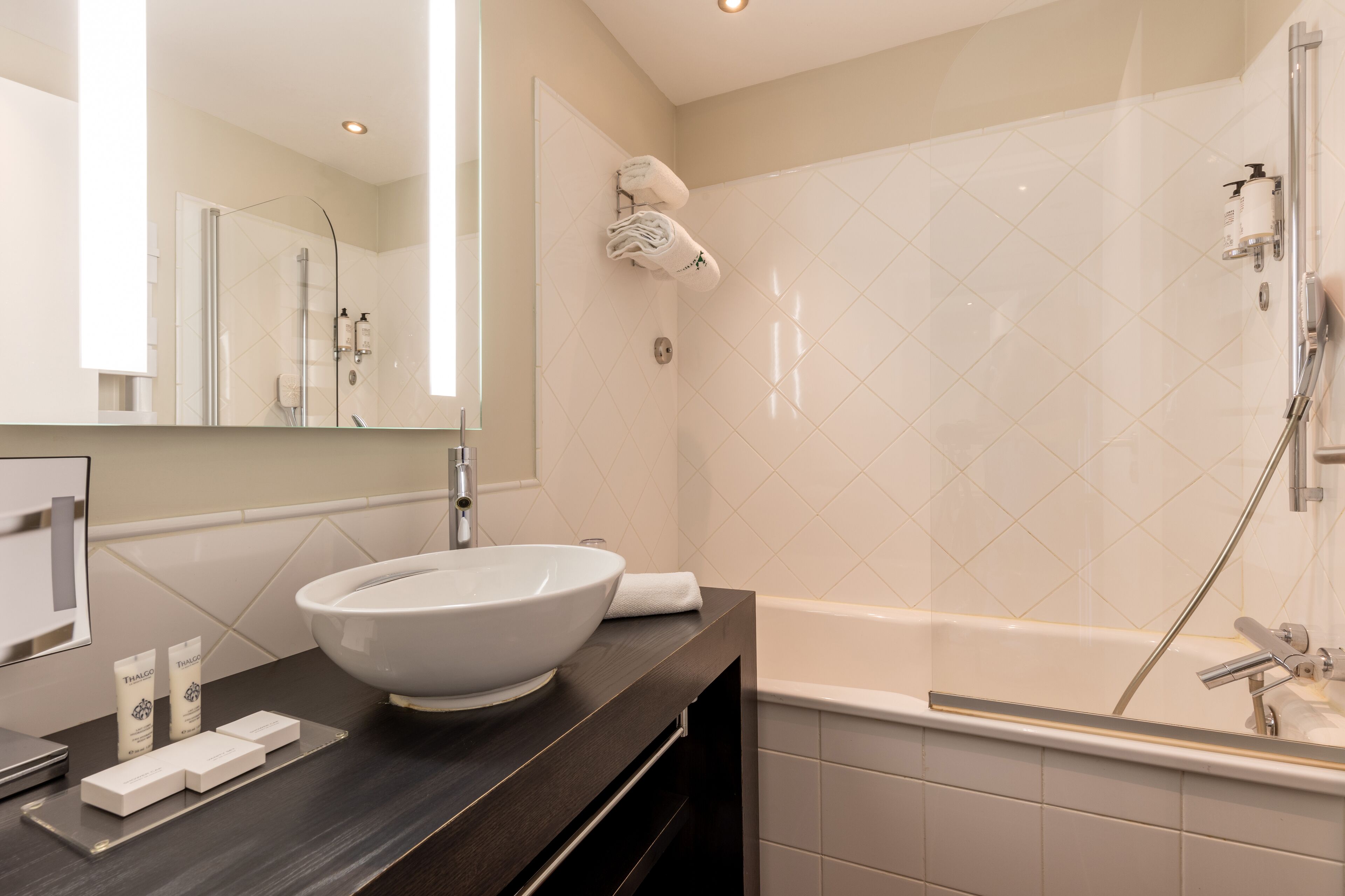 shower, bathrobes, slippers, towels