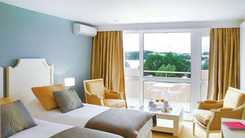Junior Suite, 1 King Bed, Terrace, Lake View | Minibar, in-room safe, desk, soundproofing