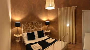 Apartment, 1 Bedroom, Patio, Garden Area | Minibar, in-room safe, free WiFi, bed sheets