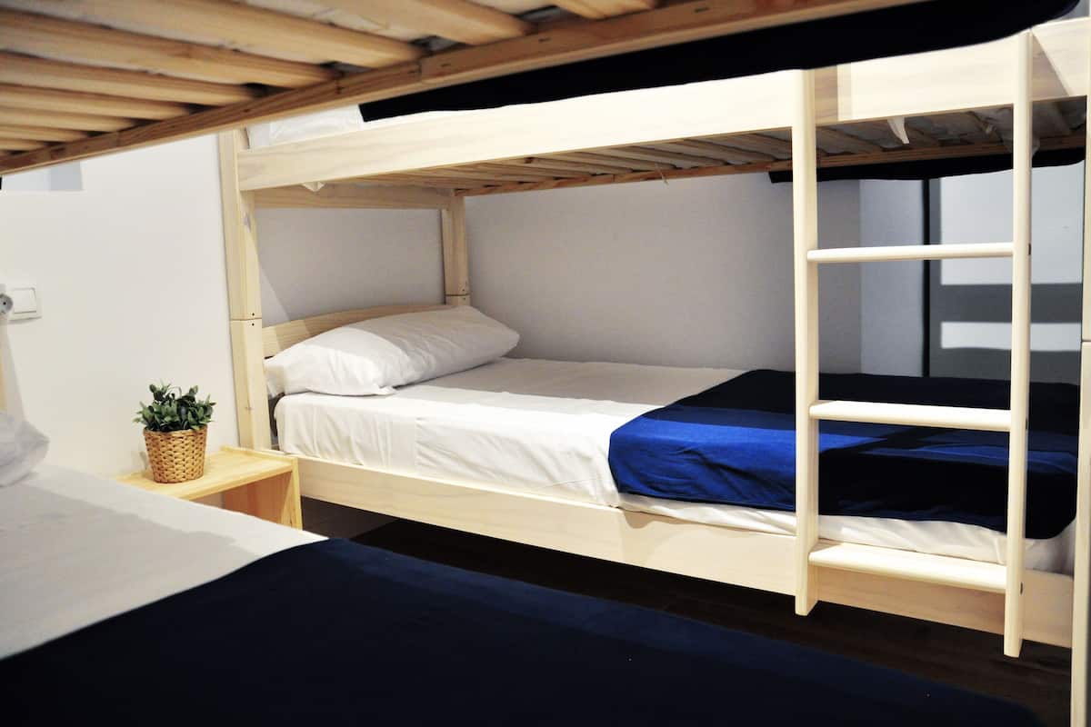 Basic Quadruple Room, Balcony | Blackout drapes, iron/ironing board, free WiFi, bed sheets
