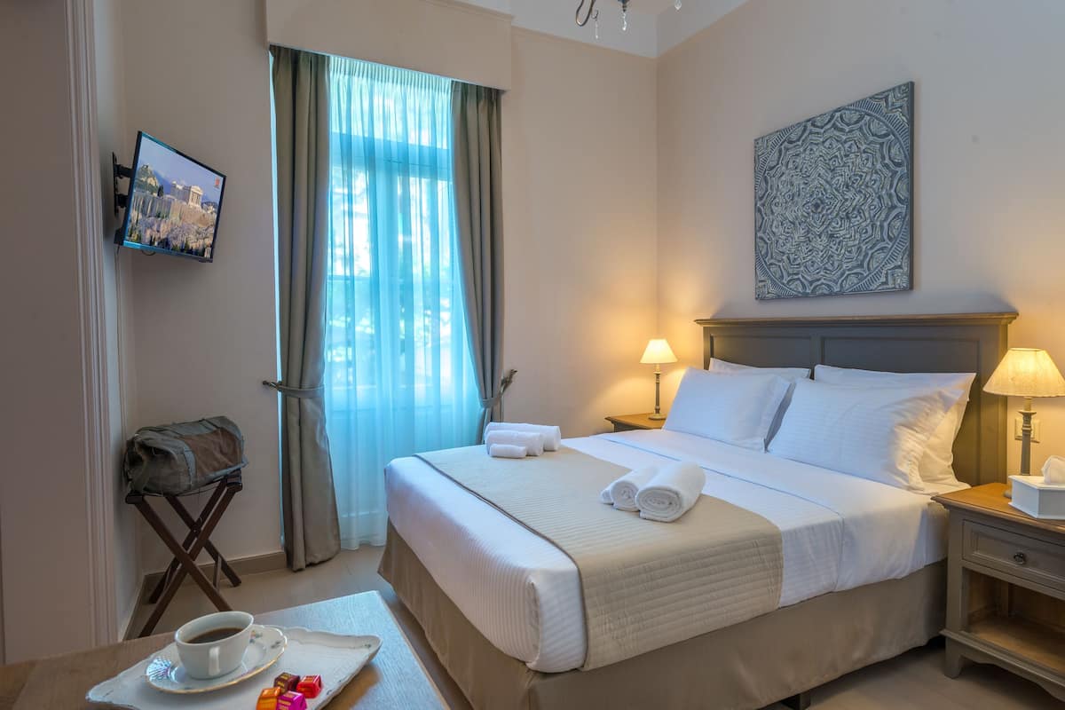Deluxe vierpersoonskamer, 2 slaapkamers, uitzicht op stad | Kameruitzicht