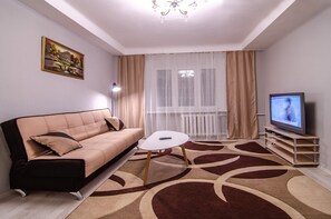Basic Apartment | Living area | 45-inch flat-screen TV with cable channels, TV - Rent Kiev Pechersk (Kyiv)