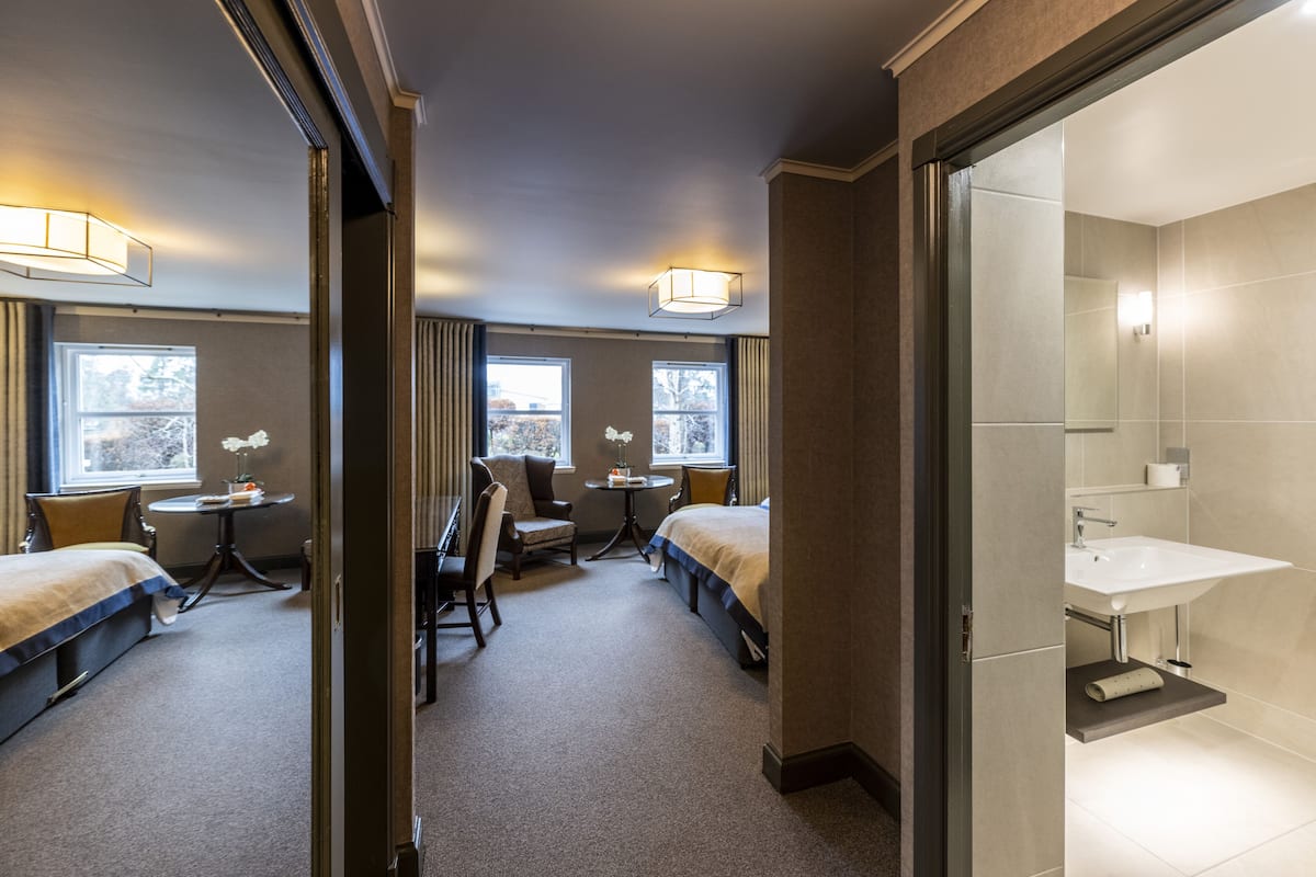 deluxe double or twin room | premium bedding, minibar, in-room safe, individually decorated