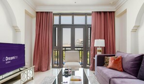 Comfort Apartment, 1 Bedroom, City View | Living room | Flat-screen TV - Dream Inn Dubai - Arabian Old Town (Dubai)