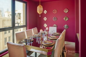 Apartment, 4 Bedrooms, Balcony, City View | In-room dining