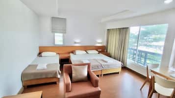 Deluxe Room | Hypo-allergenic bedding, laptop workspace, blackout drapes
