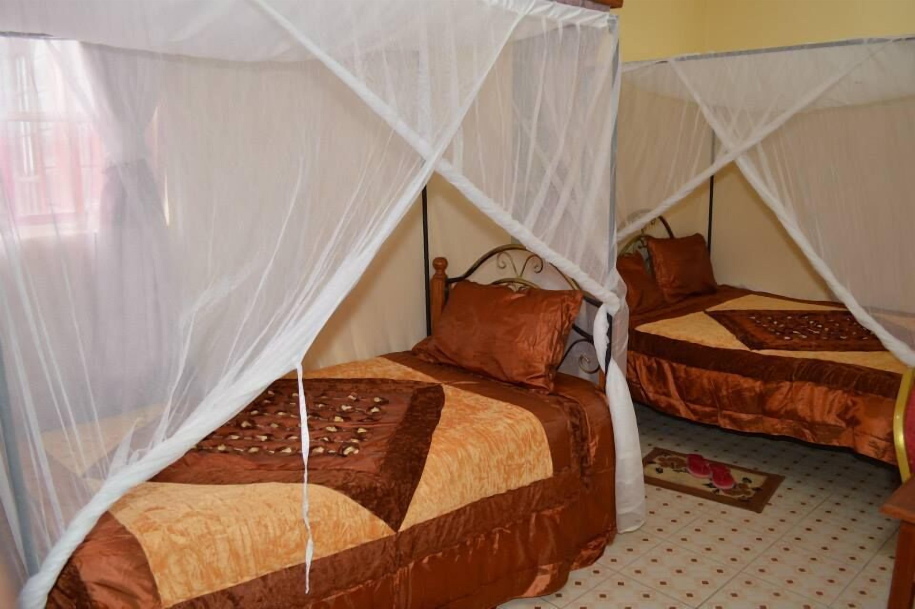 Desk, blackout curtains, iron/ironing board, free cots/infant beds