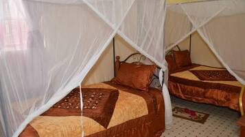 Desk, blackout curtains, iron/ironing board, free cots/infant beds