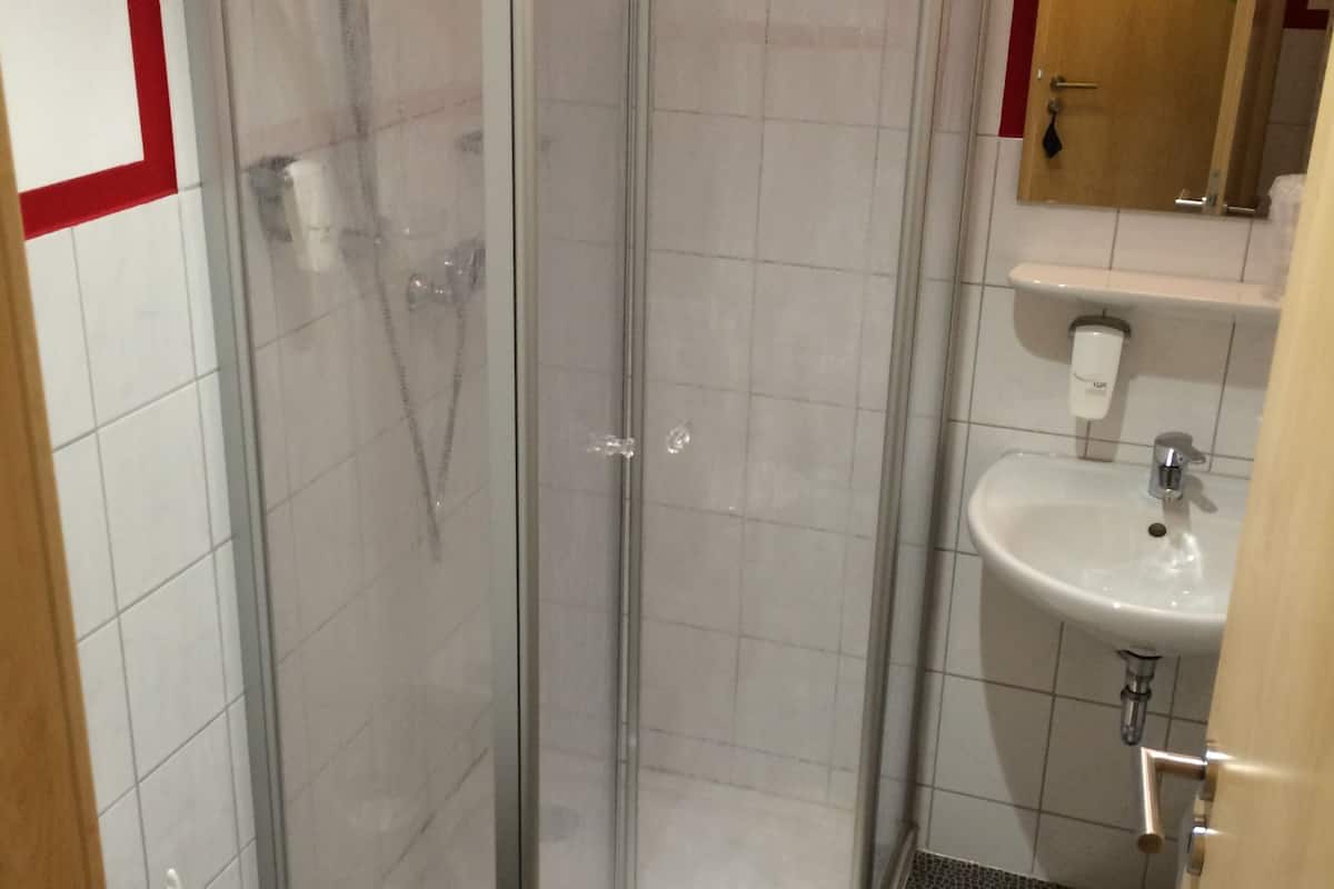 double room single use | bathroom | shower, free toiletries, hair dryer, towels