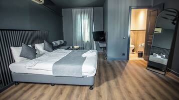Deluxe kamer | Een strijkplank/strijkijzer, gratis wifi, beddengoed