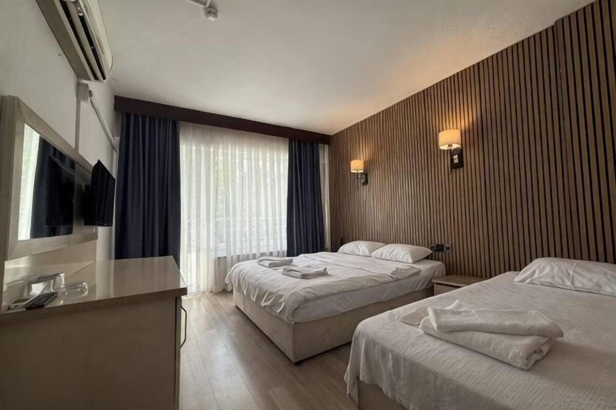 Egyptian cotton sheets, premium bedding, laptop workspace