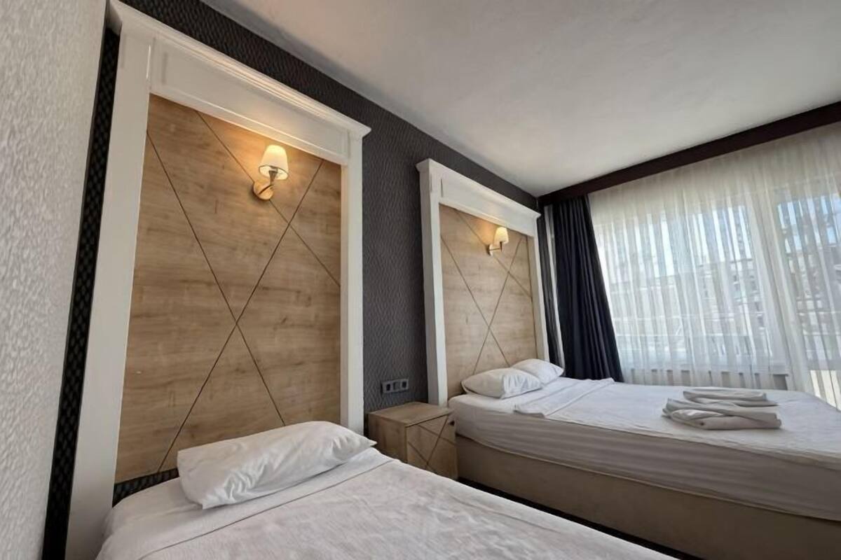 Egyptian cotton sheets, premium bedding, laptop workspace