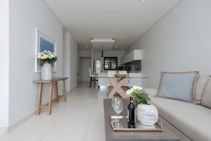 Two Bedroom Suite with Balcony | Living area | 48-inch Smart TV with satellite channels, TV - One Hyde Park (Sandton)