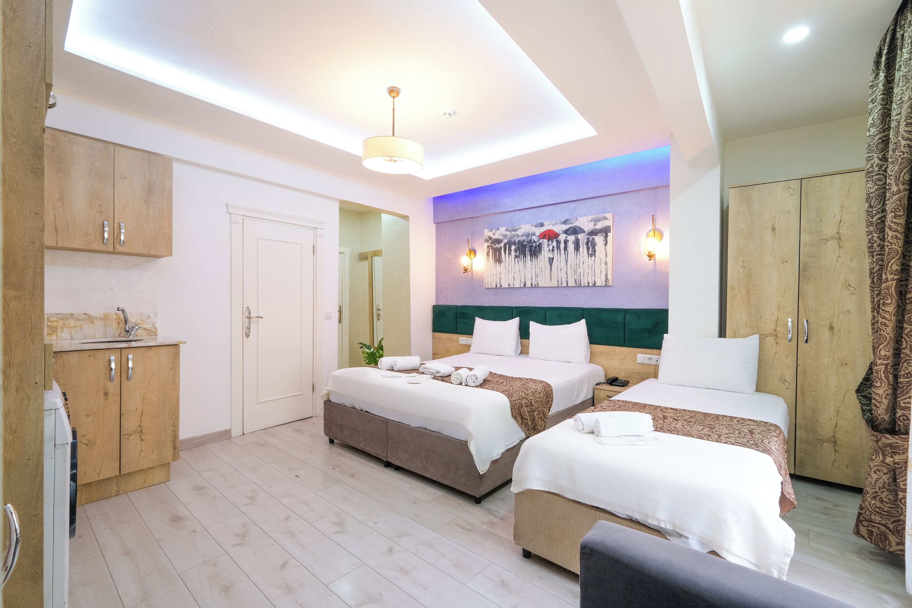 Family Quadruple Room | Premium bedding, minibar, in-room safe, individually decorated