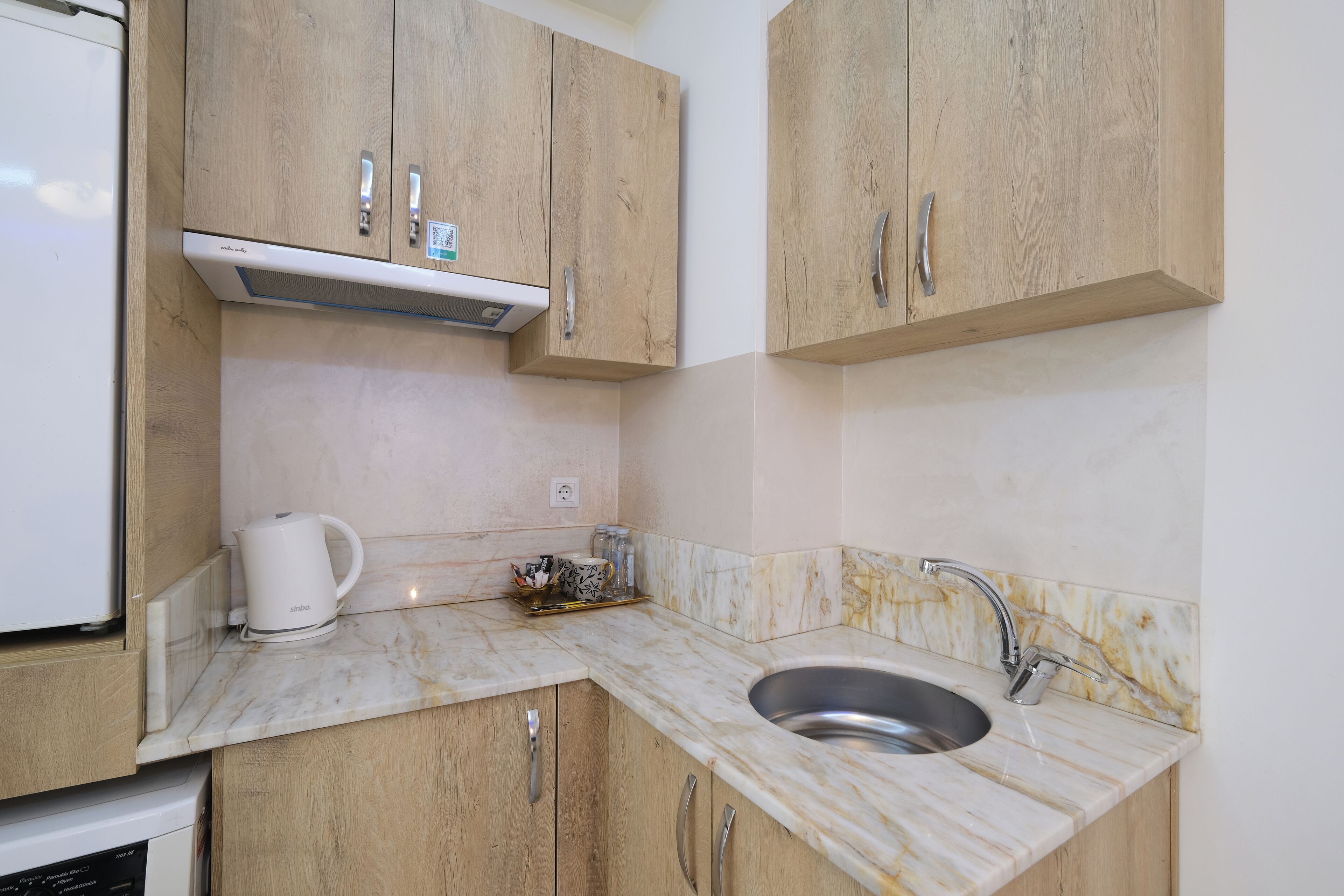 Family Quadruple Room | Private kitchen | Mini-fridge