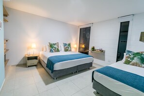 Family Room | Minibar, in-room safe, individually decorated, individually furnished
