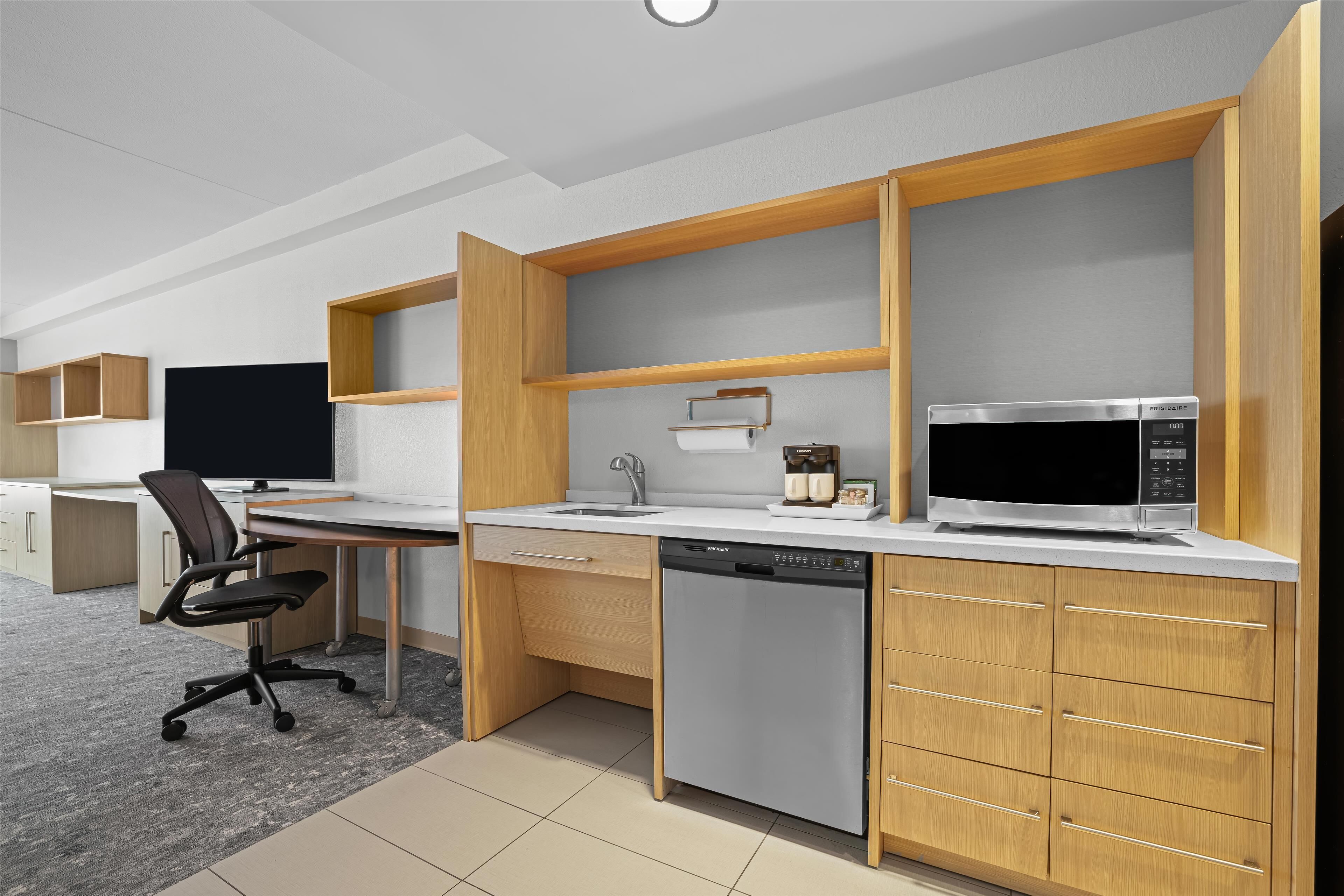 full-sized fridge, microwave, dishwasher, coffee/tea maker