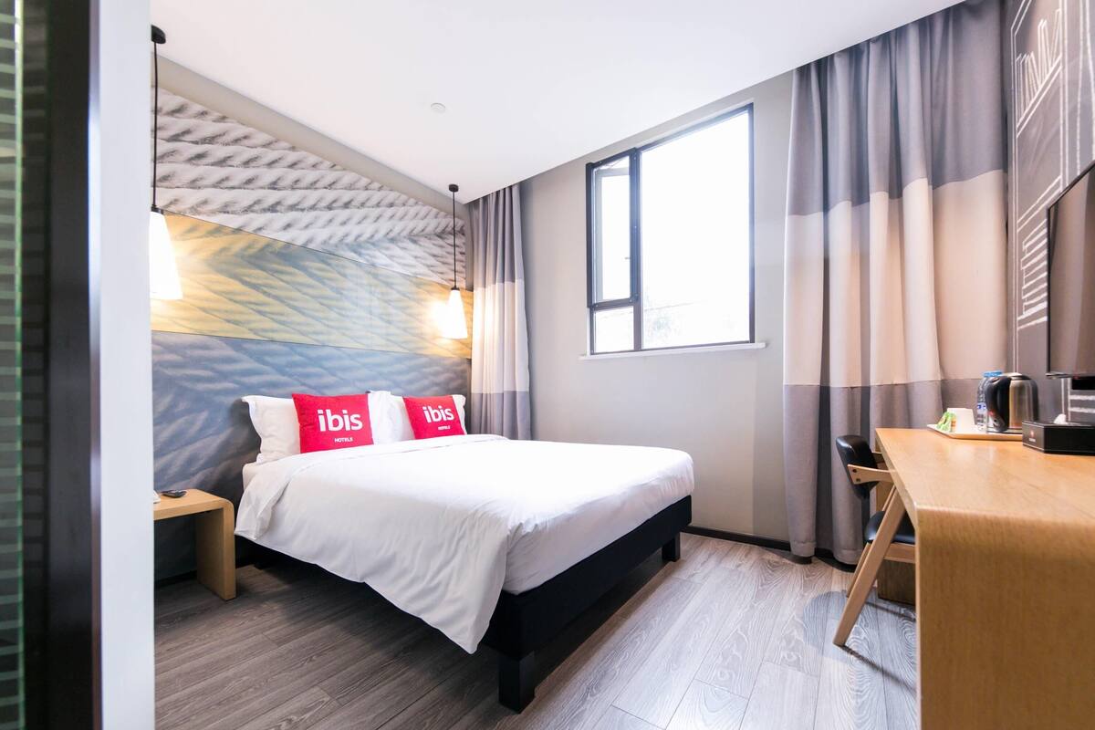 Desk, laptop workspace, blackout curtains, soundproofing