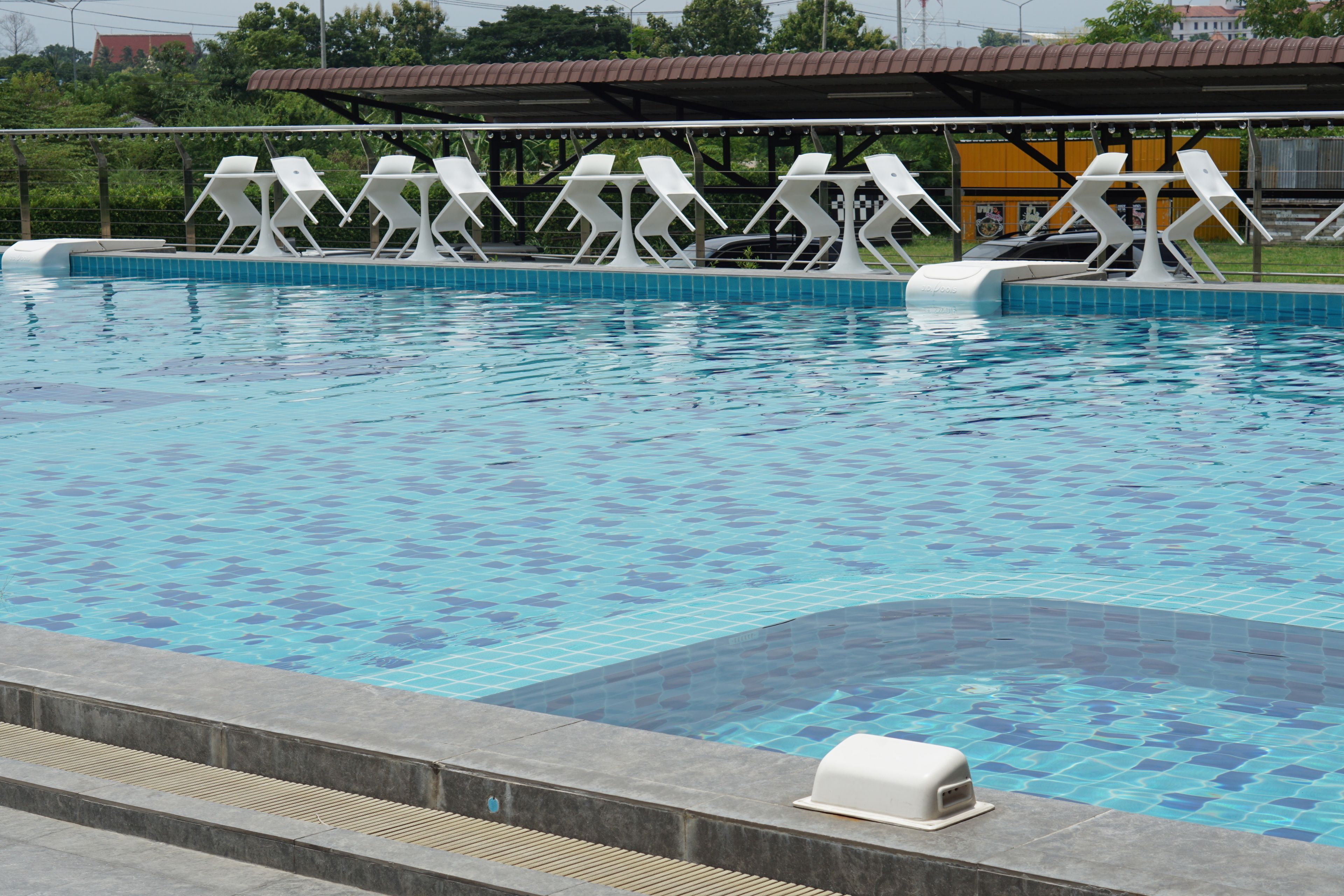 Outdoor pool, pool umbrellas, sun loungers