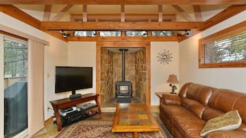 TV connectée, cheminée, Netflix, table de tennis de table