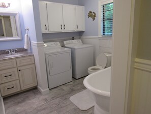 Combined shower/bathtub, hair dryer, towels, soap